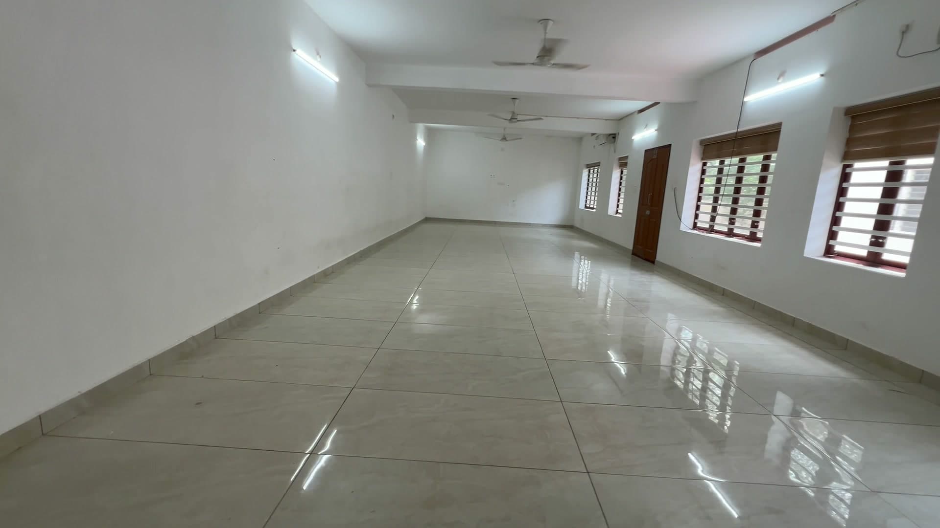 A view down the length of the bright, air-conditioned room
