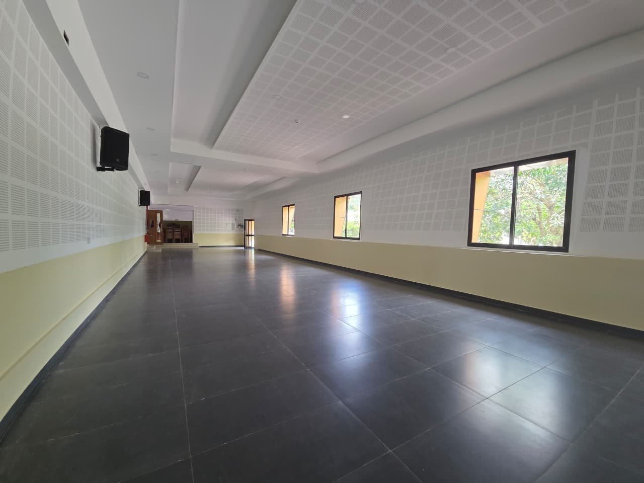 Diamond Hall — the bright, air-conditioned hall with its sloped white ceiling and tiled floor