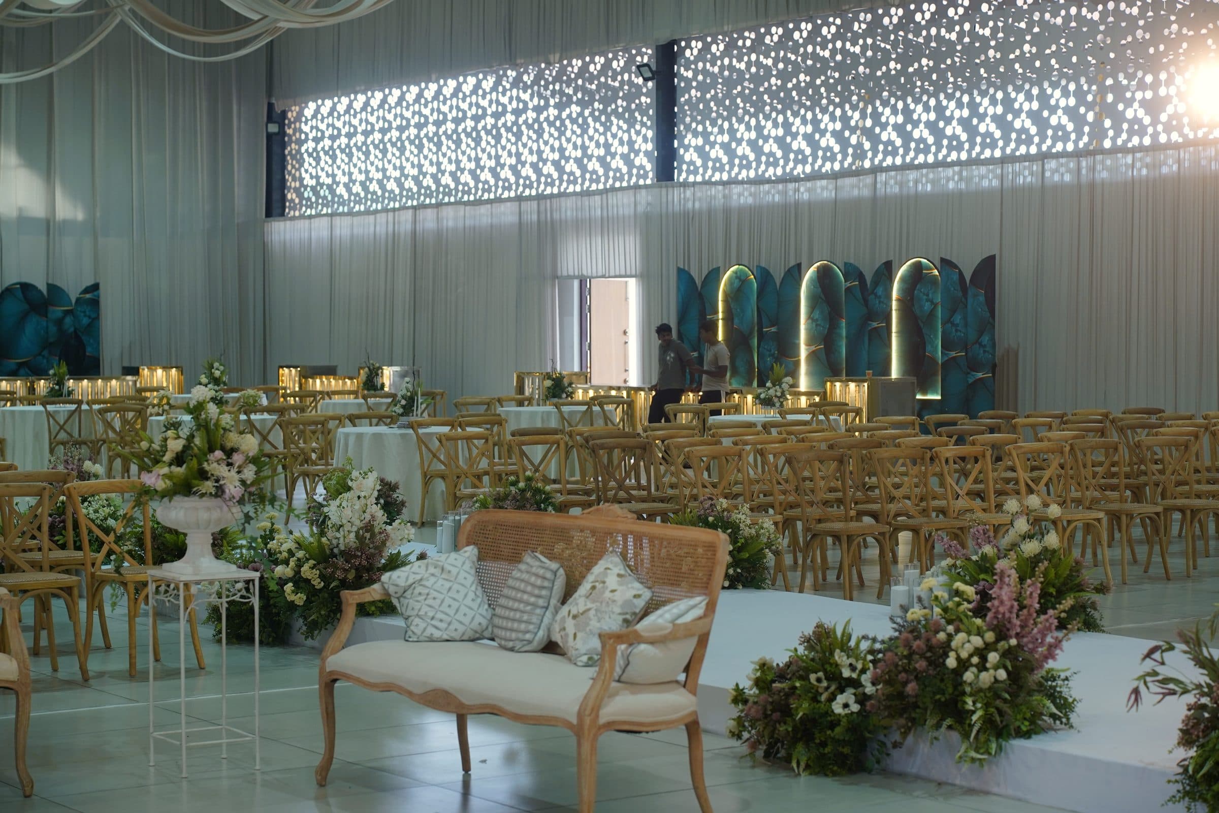 Lounge seating set among the reception tables